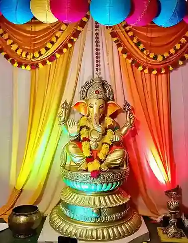 Ganpati idol with colorful drapes and lanterns for Ganesh Chaturthi decoration | Vibrant Ganpati Decoration with Lanterns and Drapes | Ganpati Decoration Ideas | Decorations Guru